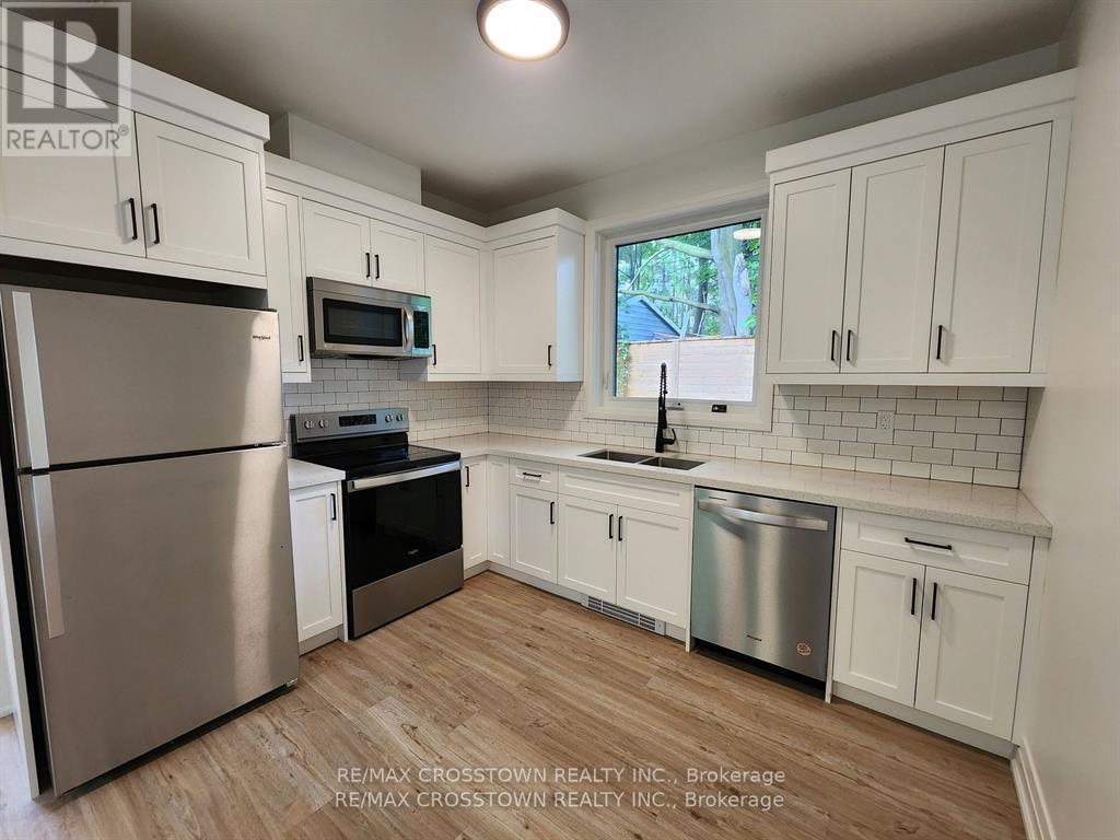 Gdn Ste - 120 Dundonald Street, Barrie, ON - Indoor Photo Showing Kitchen With Double Sink