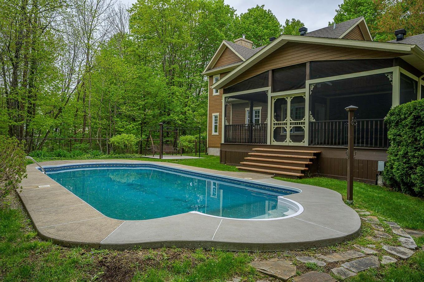 Face arrière - 746 Crois. Adèle, Prévost, QC - Outdoor With In Ground Pool With Deck Patio Veranda