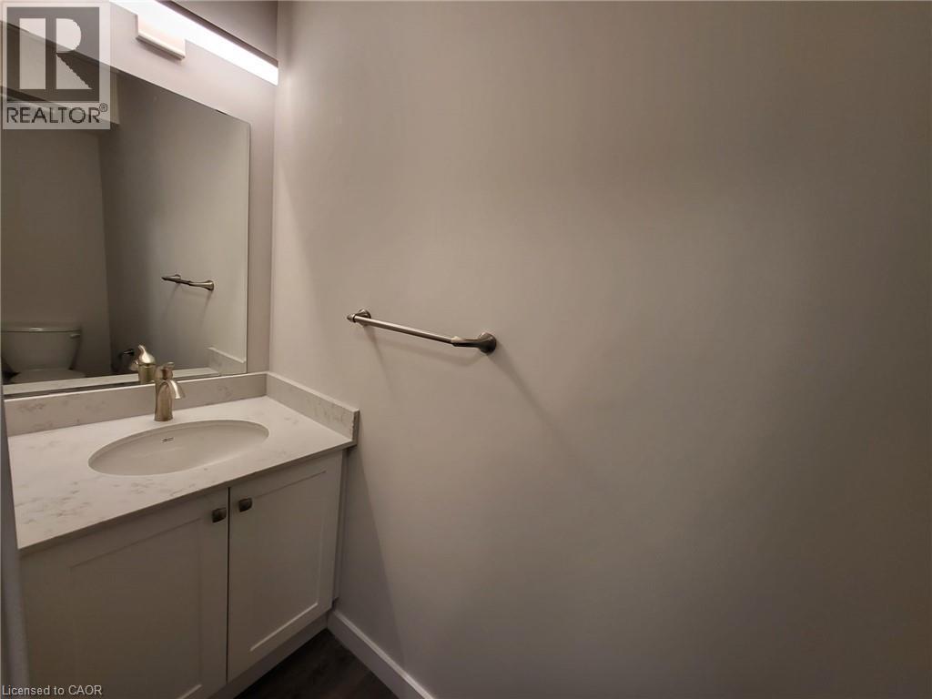 Bathroom with vanity and toilet - 118 Gravel Ridge Trail Unit# F17, Kitchener, ON - Indoor Photo Showing Bathroom