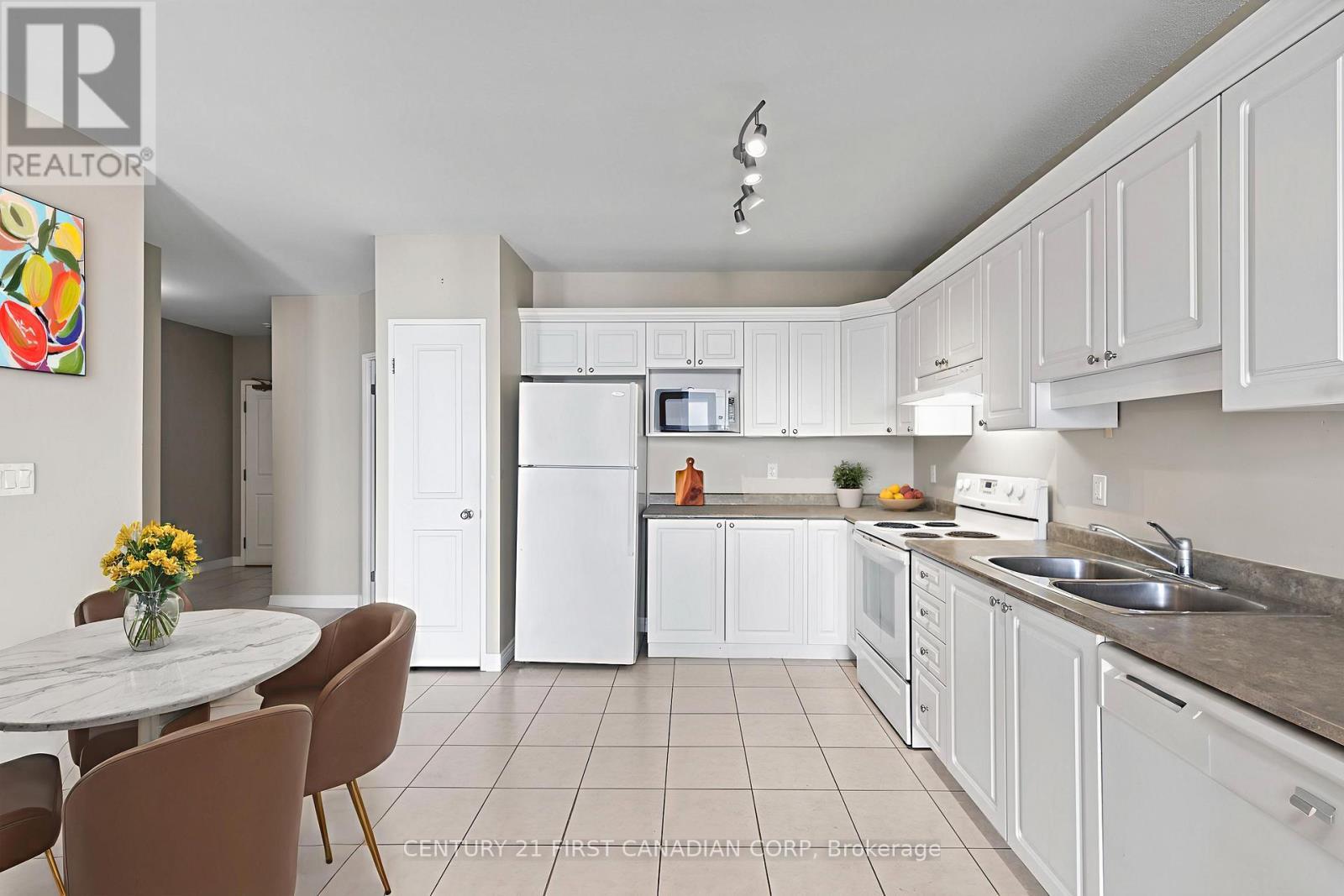 701 - 353 Commissioners Road W, London South (South D), ON - Indoor Photo Showing Kitchen With Double Sink