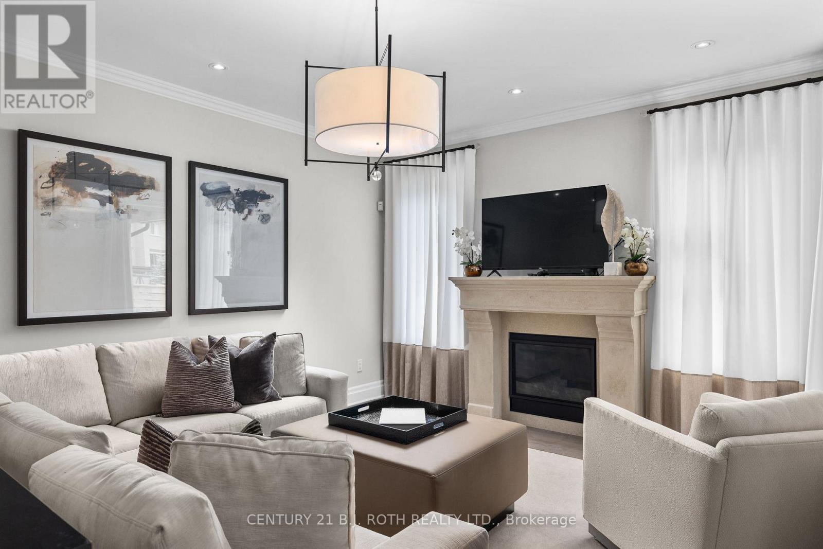3 Cameron Street, Springwater, ON - Indoor Photo Showing Living Room With Fireplace