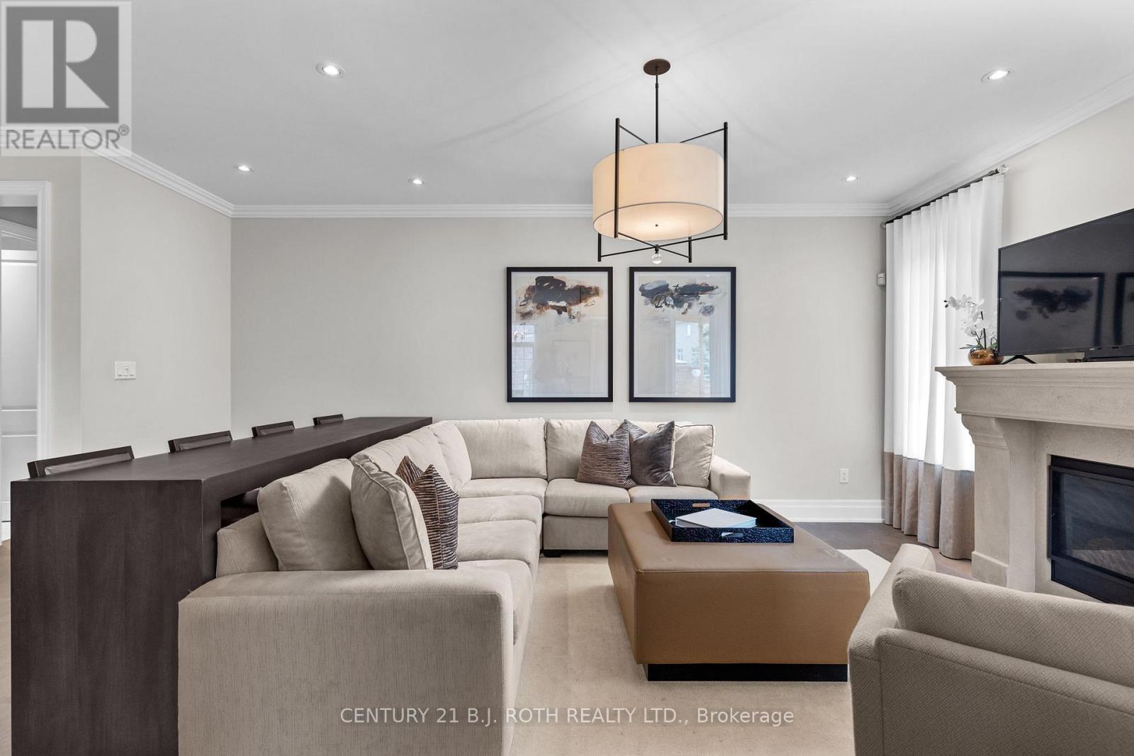 3 Cameron Street, Springwater, ON - Indoor Photo Showing Living Room With Fireplace