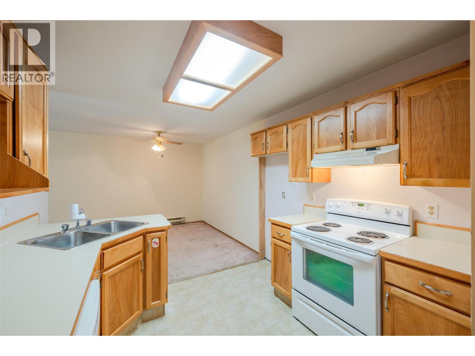 3426 Hemlock Street Unit# 109, Penticton, BC - Indoor Photo Showing Kitchen With Double Sink