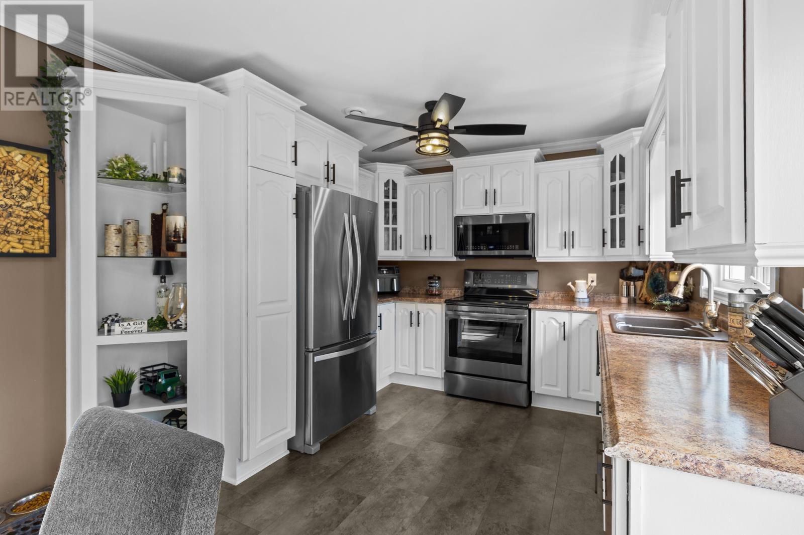 18 Shaheen Crescent, Come By Chance, NL - Indoor Photo Showing Kitchen With Stainless Steel Kitchen With Double Sink