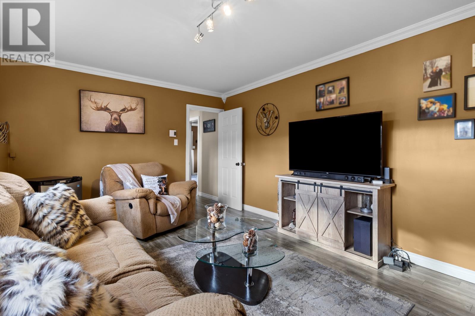 18 Shaheen Crescent, Come By Chance, NL - Indoor Photo Showing Living Room