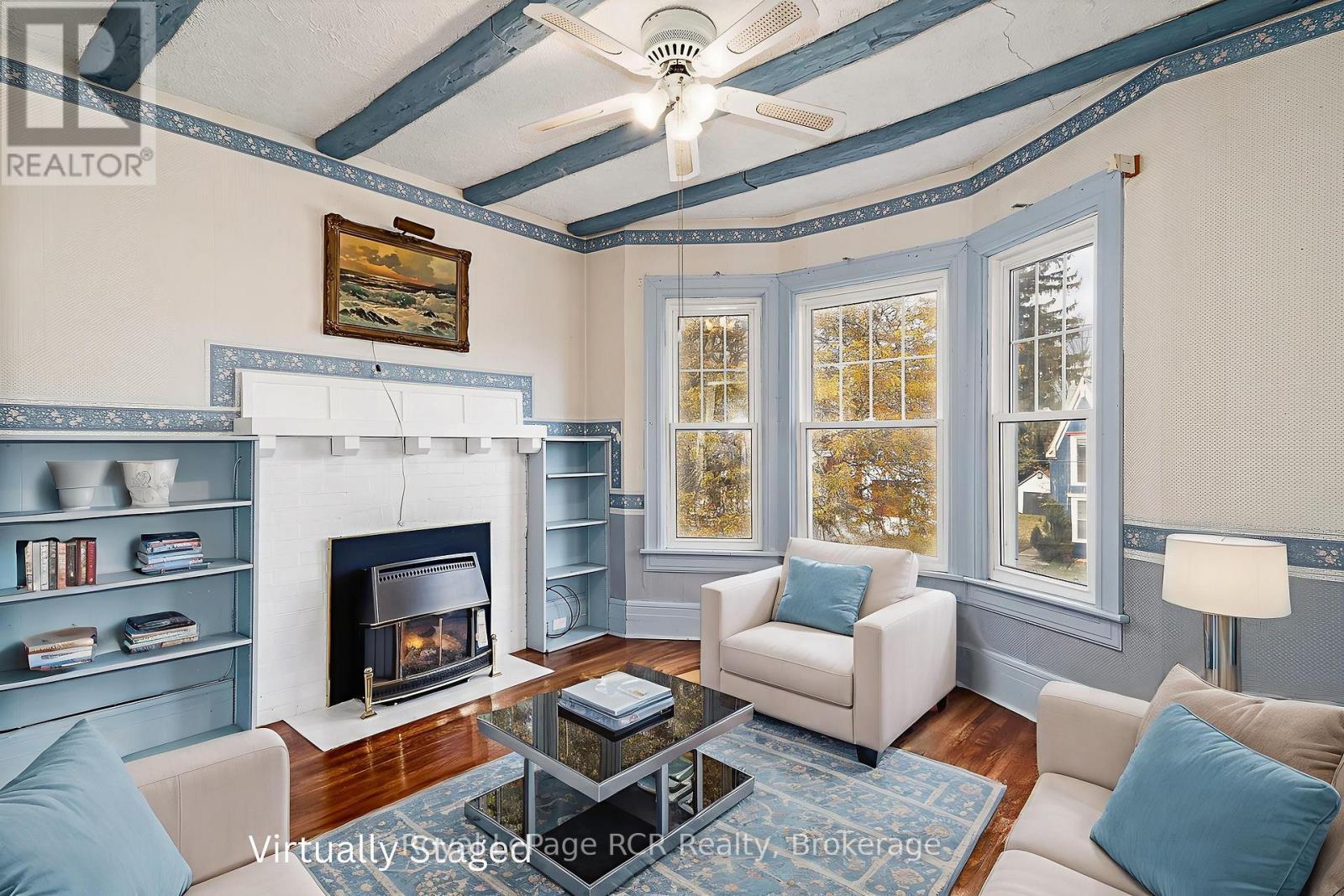 Virtually Staged - 143 Trowbridge Street W, Meaford, ON - Indoor Photo Showing Living Room With Fireplace