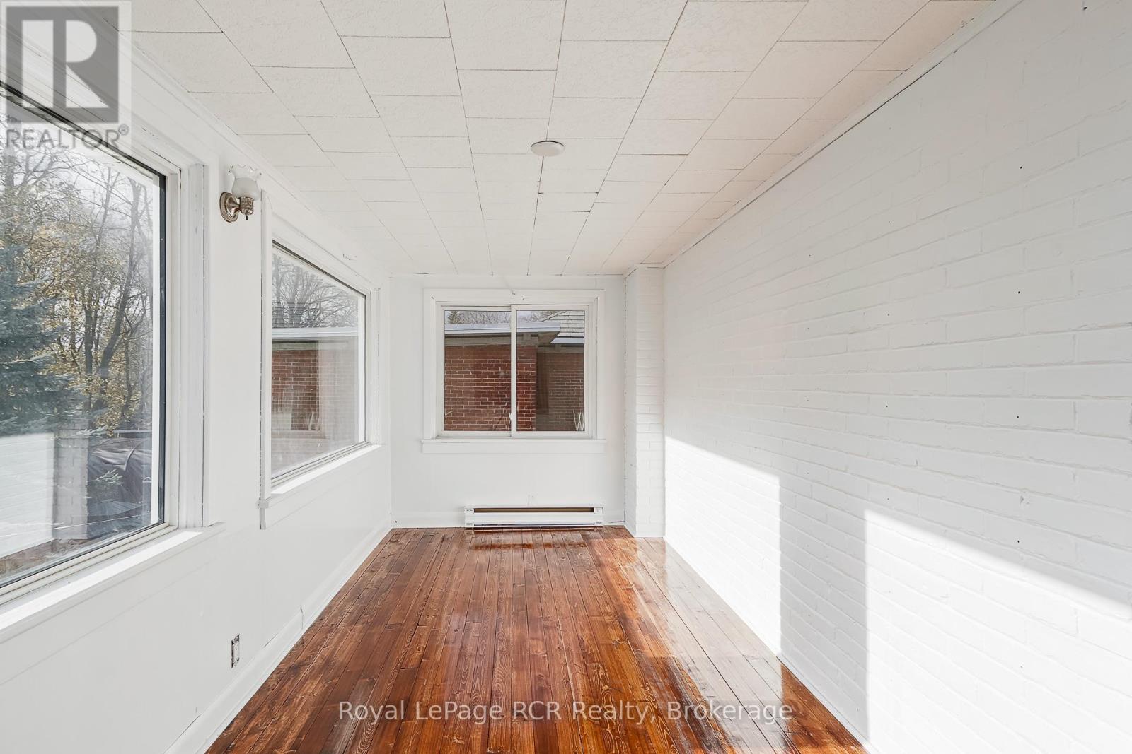 Peaceful Sunroom overlooking backyard - 143 Trowbridge Street W, Meaford, ON - Indoor Photo Showing Other Room