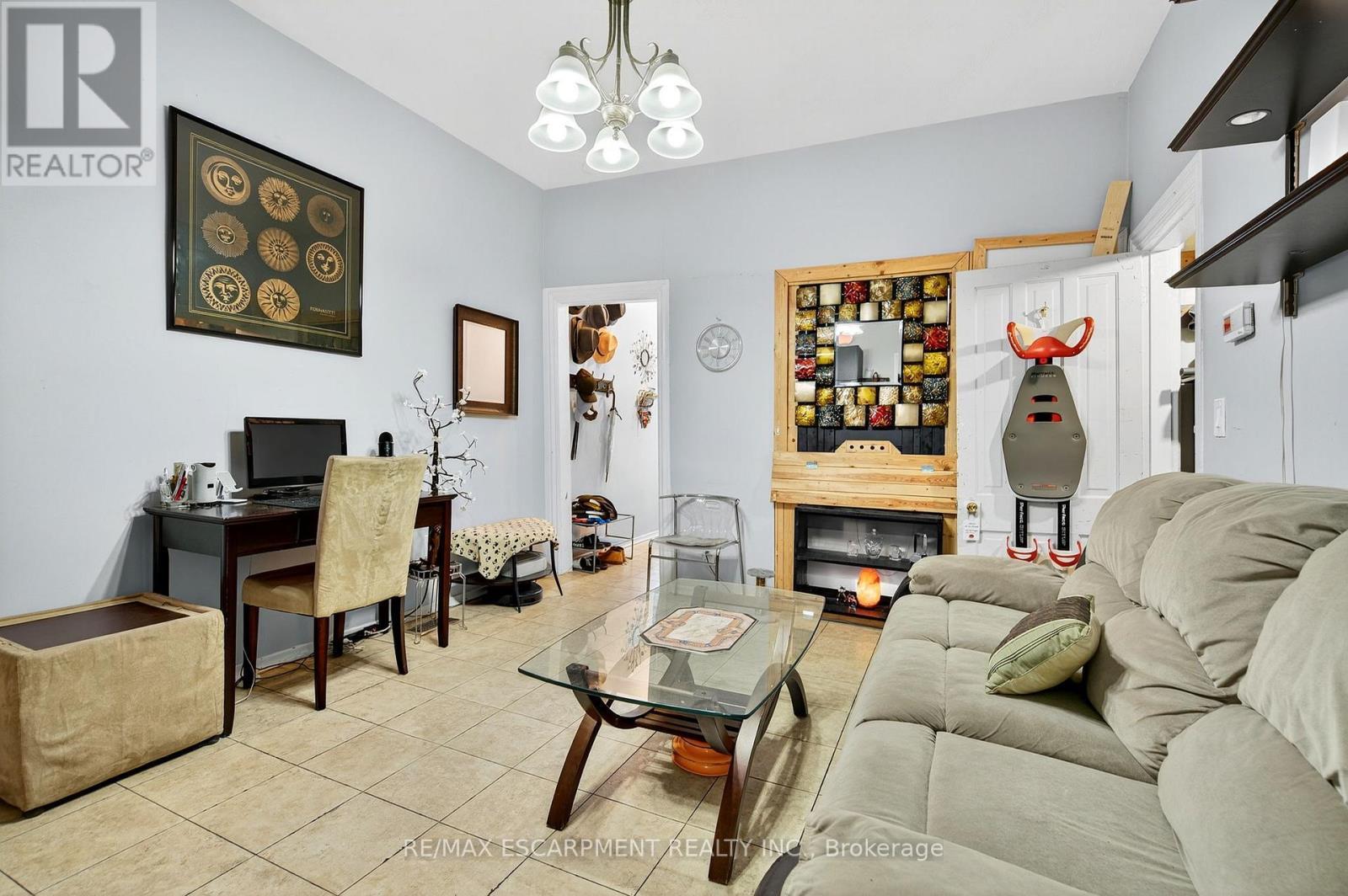 79 Murray Street E, Hamilton, ON - Indoor Photo Showing Living Room With Fireplace