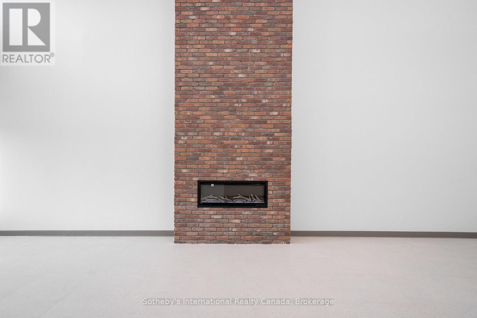 322 - 121 Mary Street, Clearview (Creemore), ON - Indoor Photo Showing Other Room With Fireplace