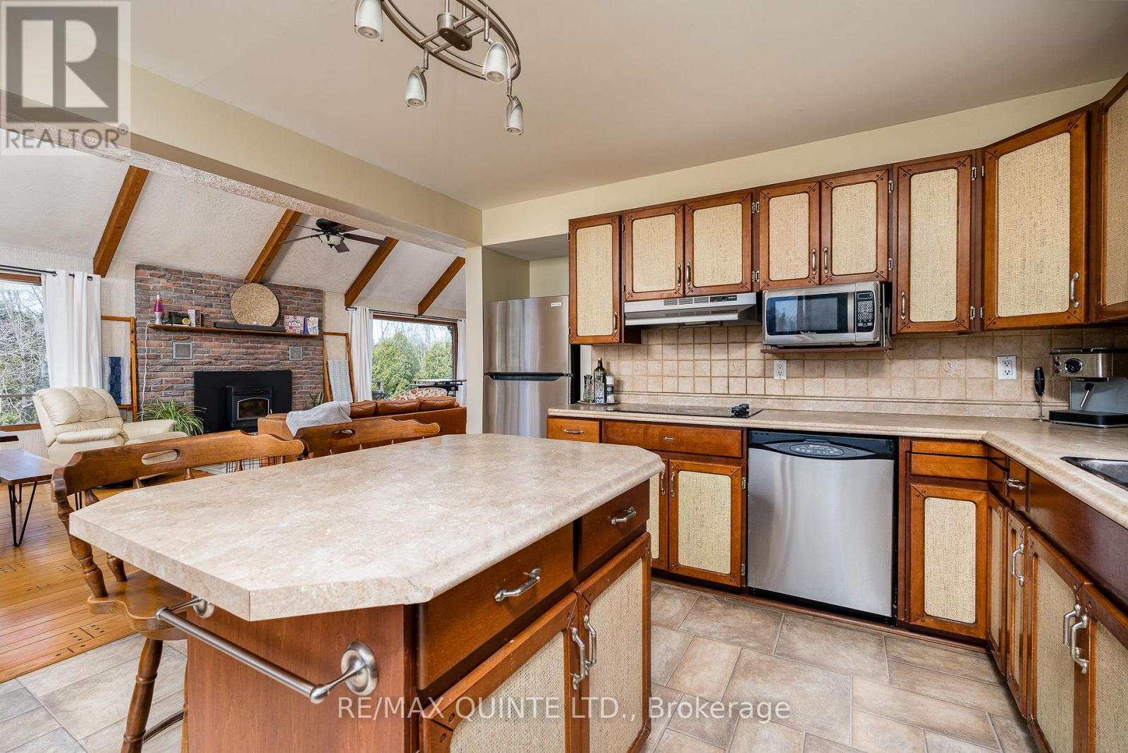 252 Maines Road, Tweed (Hungerford (Twp)), ON - Indoor Photo Showing Kitchen With Fireplace