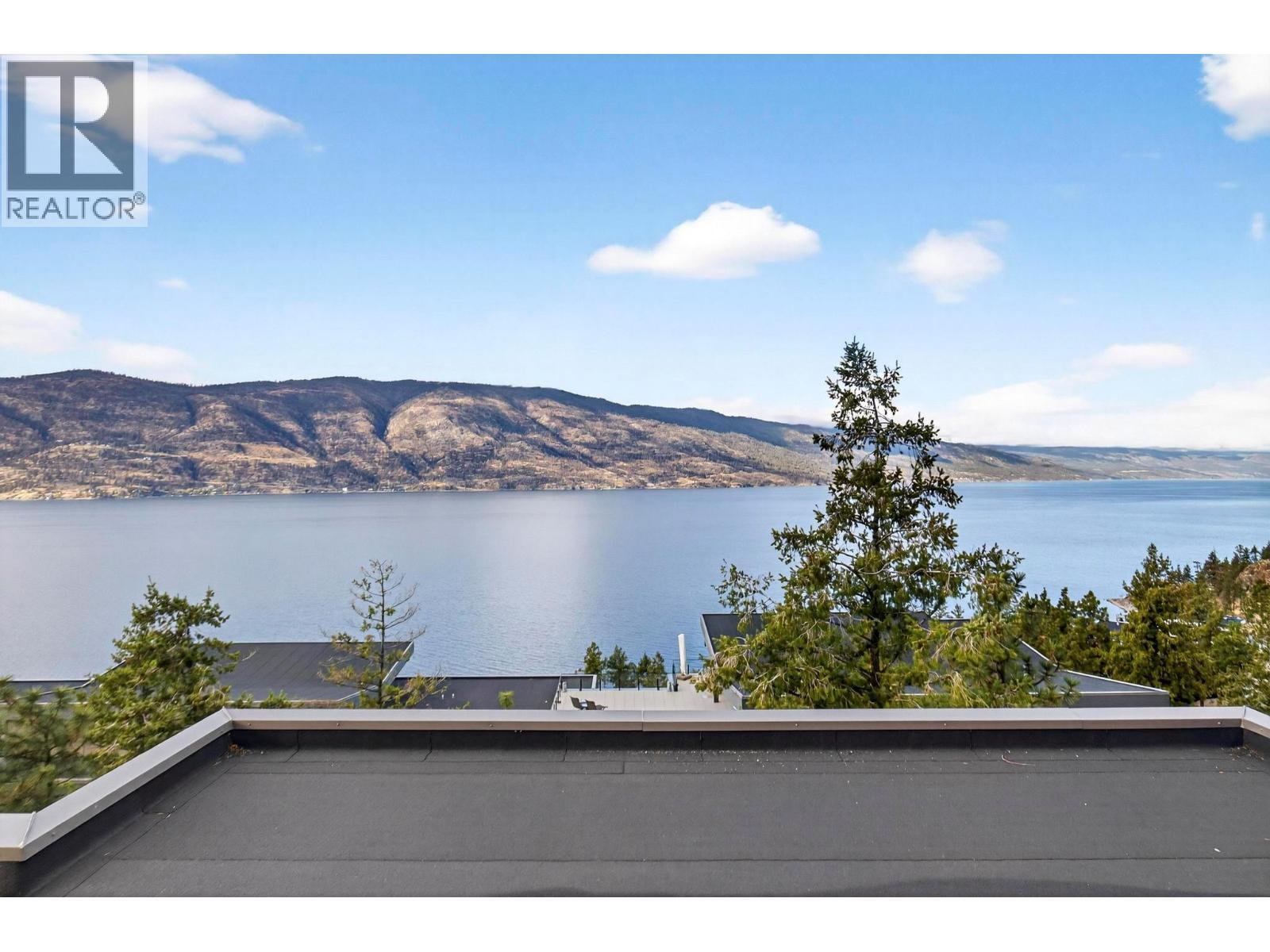 3434 Mckinley Beach Drive Unit# 408, Kelowna, BC - Outdoor With Body Of Water With View