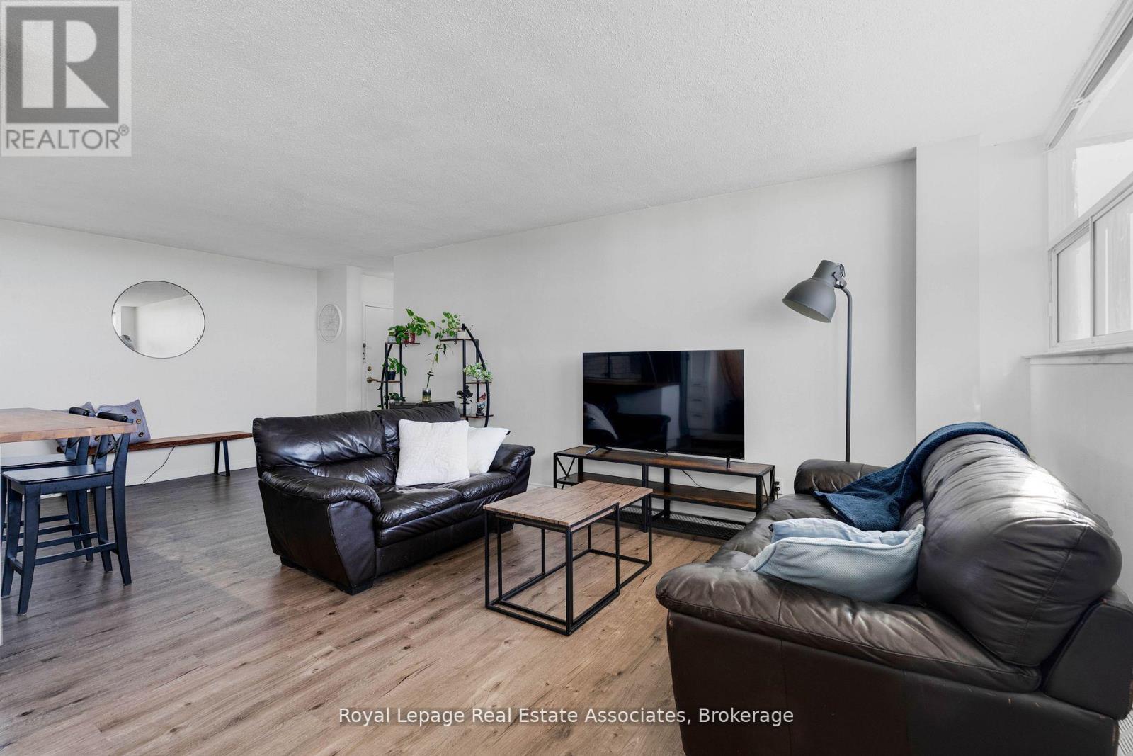 1204 - 215 Glenridge Avenue, St. Catharines, ON - Indoor Photo Showing Living Room