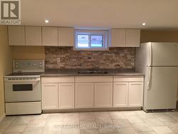 Basement Apt. Kitchen -