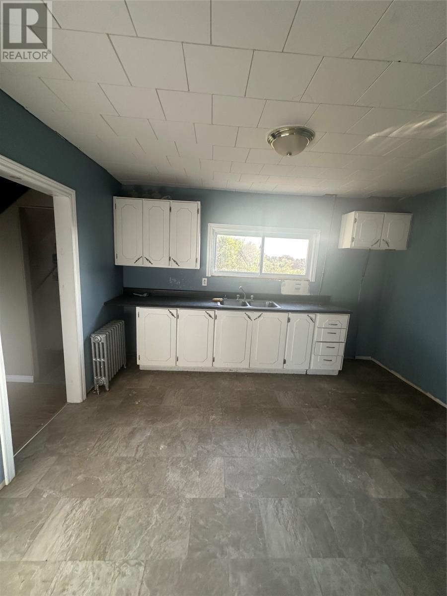 94 Memorial Street, Bell Island, NL - Indoor Photo Showing Garage