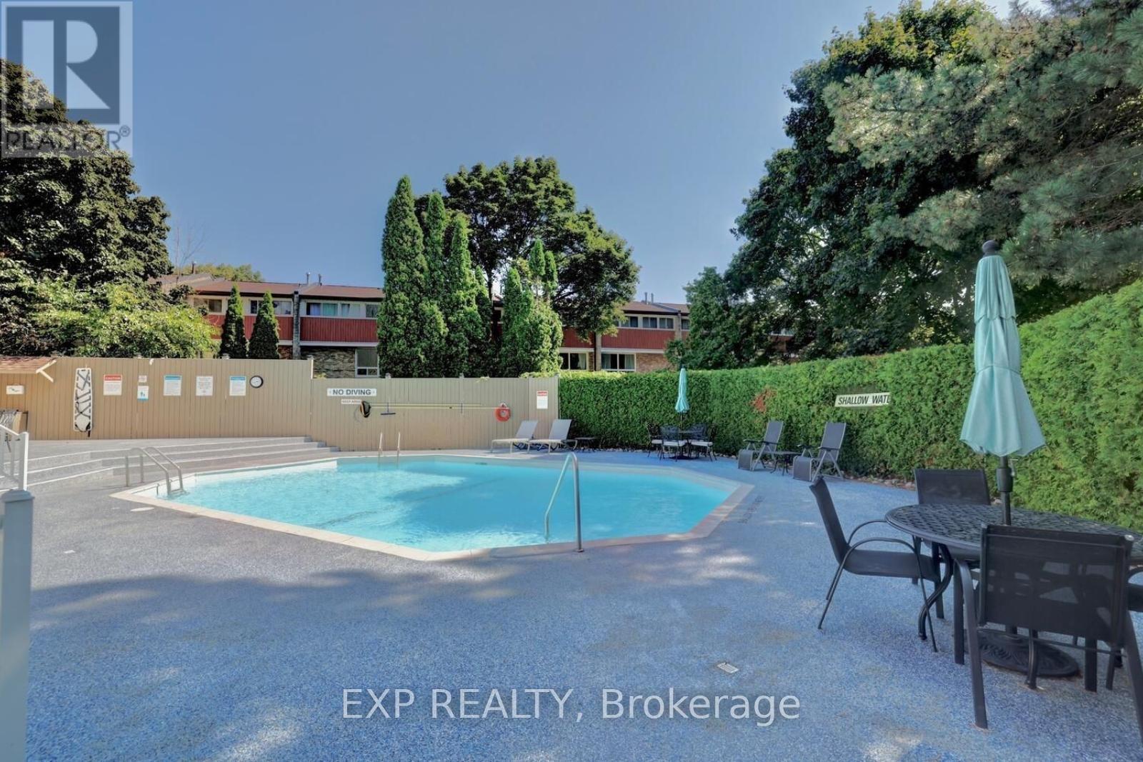 304 - 965 Inverhouse Drive, Mississauga, ON - Outdoor With In Ground Pool