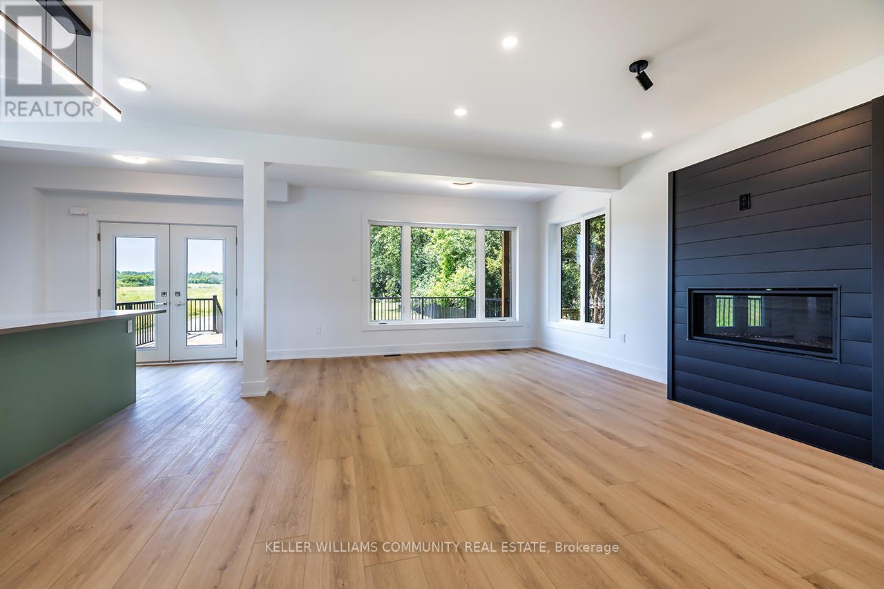 2246 Highway 2, Clarington, ON - Indoor Photo Showing Living Room With Fireplace
