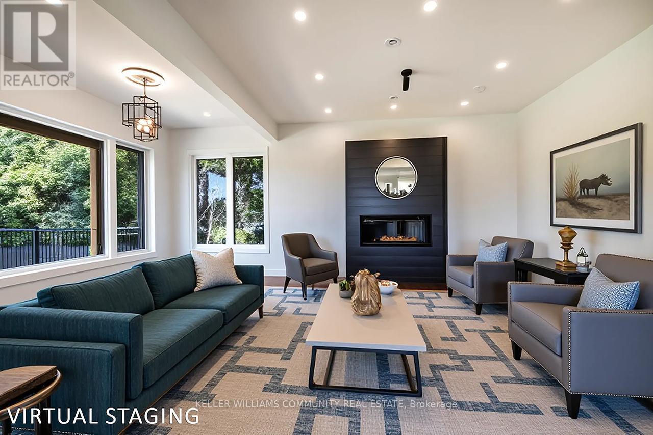 2246 Highway 2, Clarington, ON - Indoor Photo Showing Living Room With Fireplace