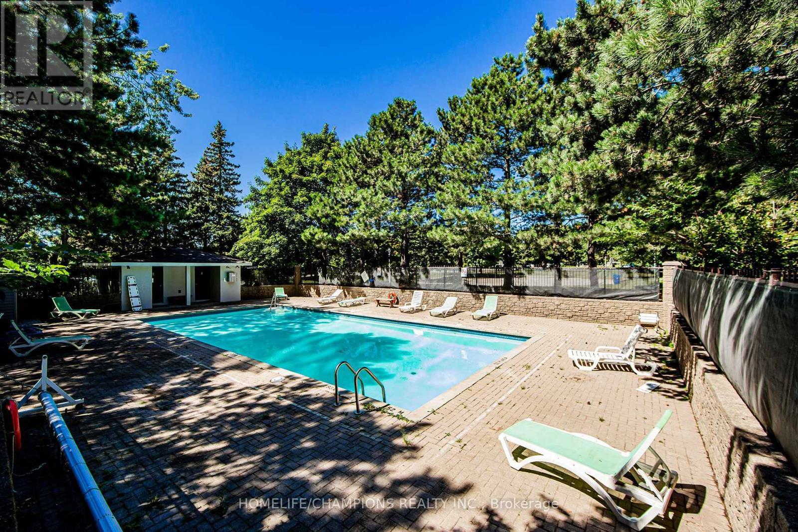 610 - 5 Greystone Walk Drive, Toronto, ON - Outdoor With In Ground Pool