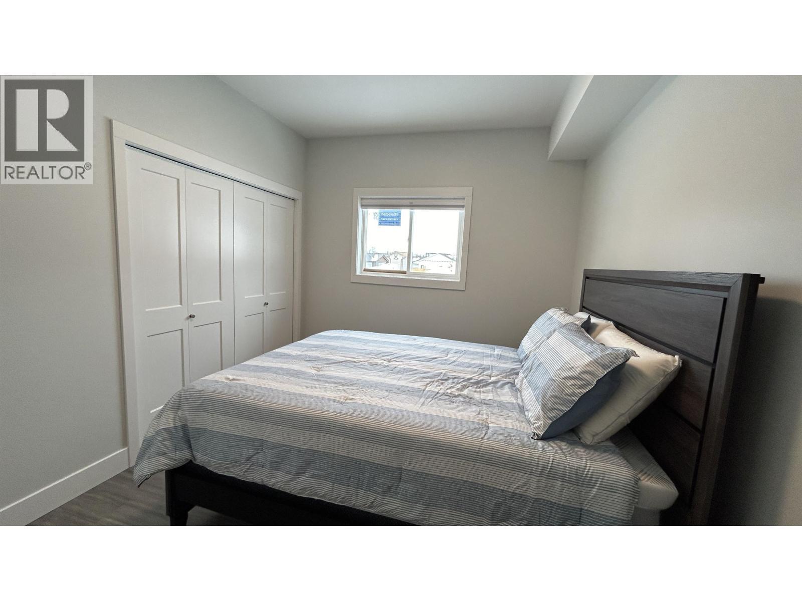 14 105 Forest Ridge Road, 100 Mile House, BC - Indoor Photo Showing Bedroom