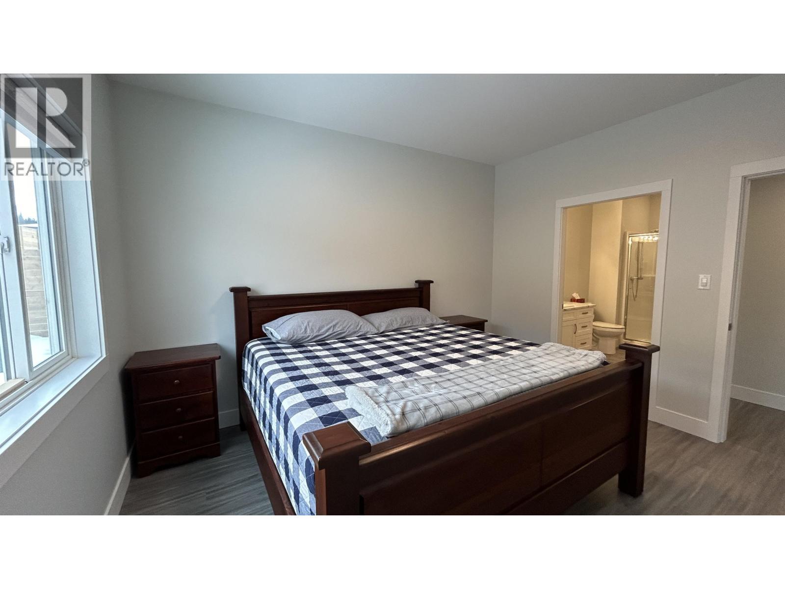 14 105 Forest Ridge Road, 100 Mile House, BC - Indoor Photo Showing Bedroom
