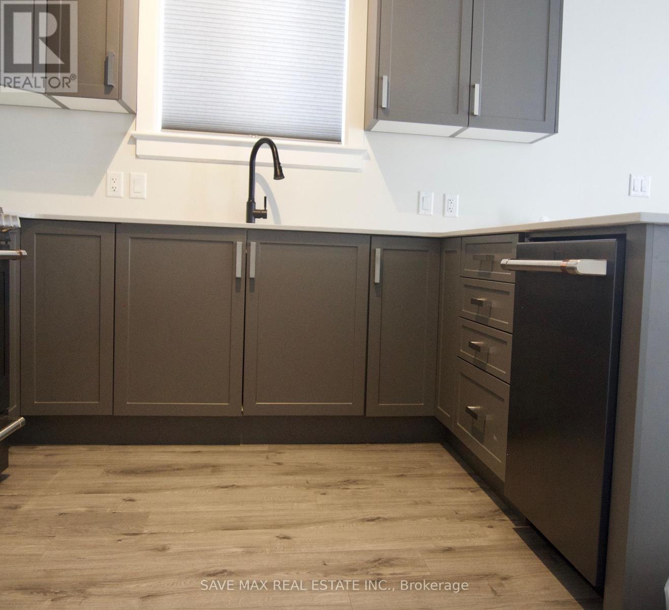 189 Dr Richard James Crescent E, Loyalist, ON - Indoor Photo Showing Kitchen