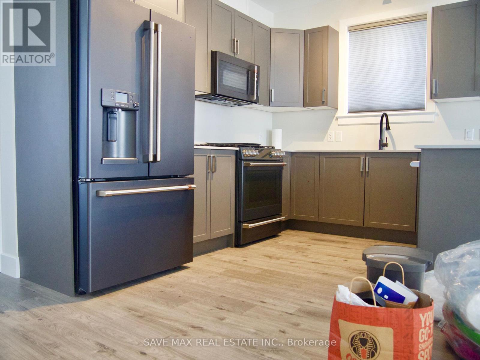 189 Dr Richard James Crescent E, Loyalist, ON - Indoor Photo Showing Kitchen With Stainless Steel Kitchen