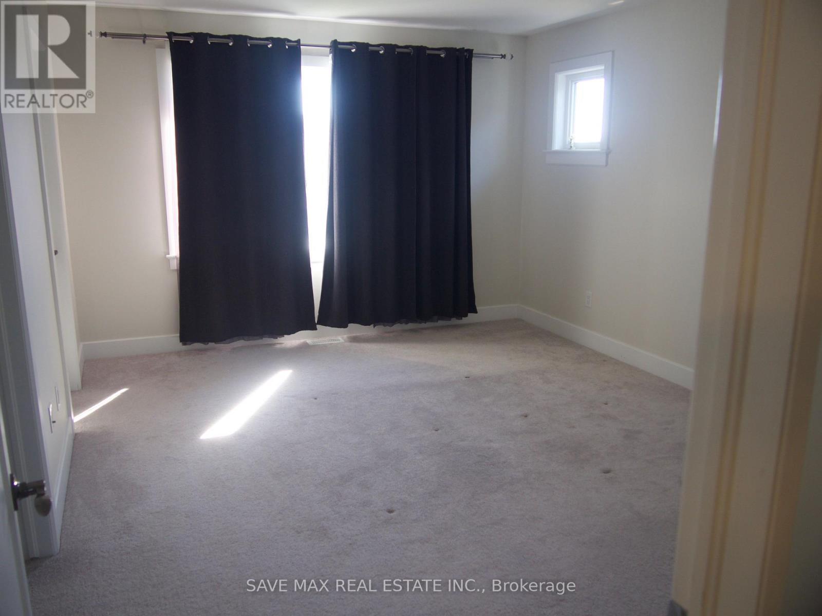 189 Dr Richard James Crescent E, Loyalist, ON - Indoor Photo Showing Other Room