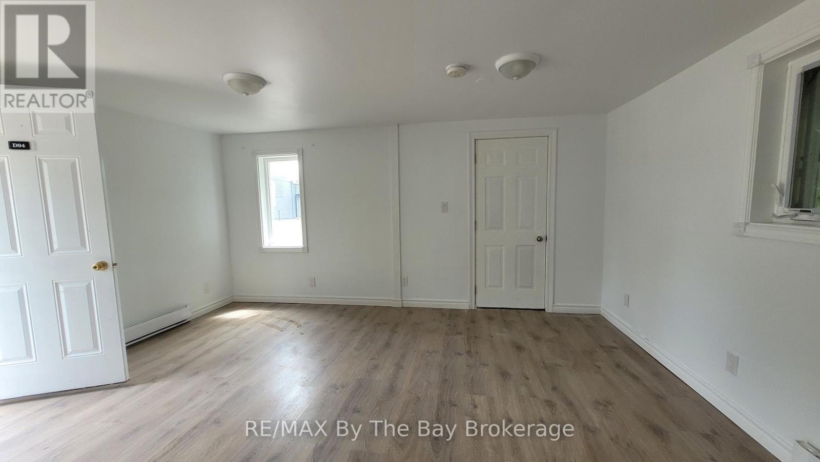 2nd door to the exterior - D04 - 280 River Road E, Wasaga Beach, ON - Indoor Photo Showing Other Room