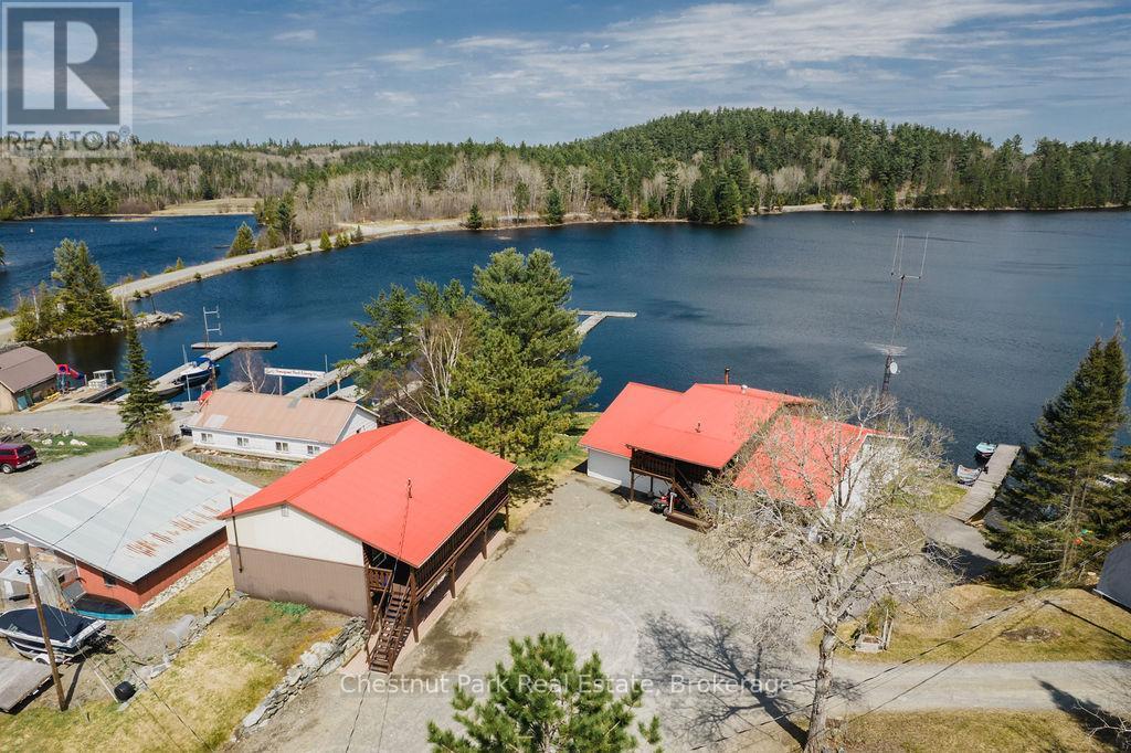 Motel on left, Main lodge on right - 51 Stevens Road, Temagami, ON