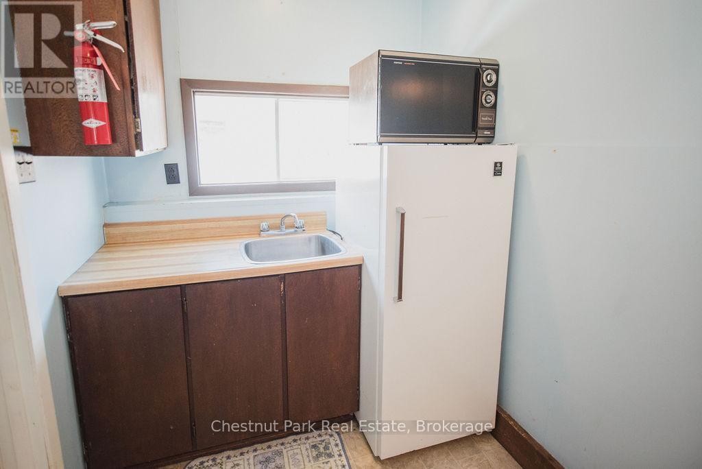 Motel unit on upper floor of Motel building - 51 Stevens Road, Temagami, ON