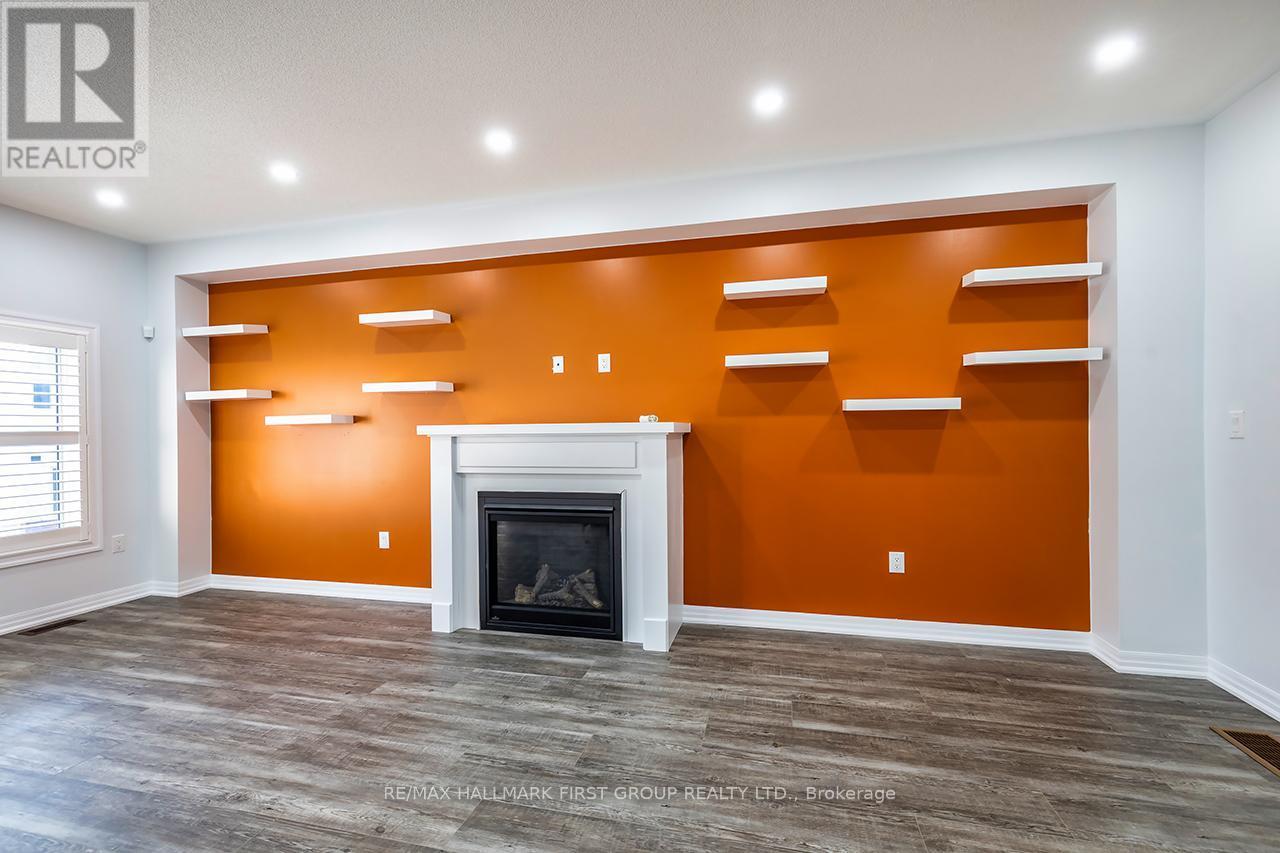 183 Flood Avenue, Clarington (Newcastle), ON - Indoor With Fireplace