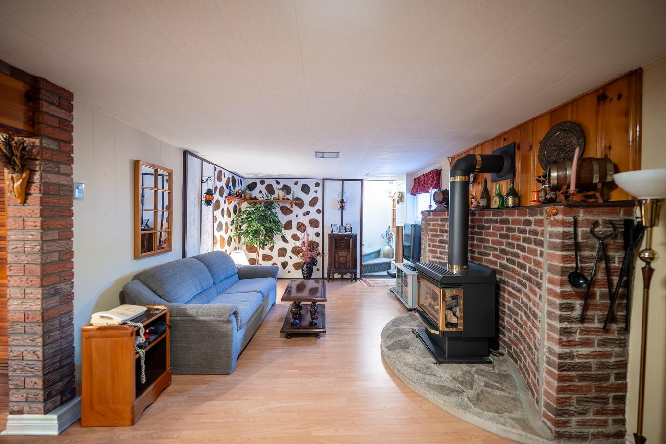 Family room - 2559 Rue Joliette, Longueuil (Le Vieux-Longueuil), QC - Indoor Photo Showing Living Room With Fireplace