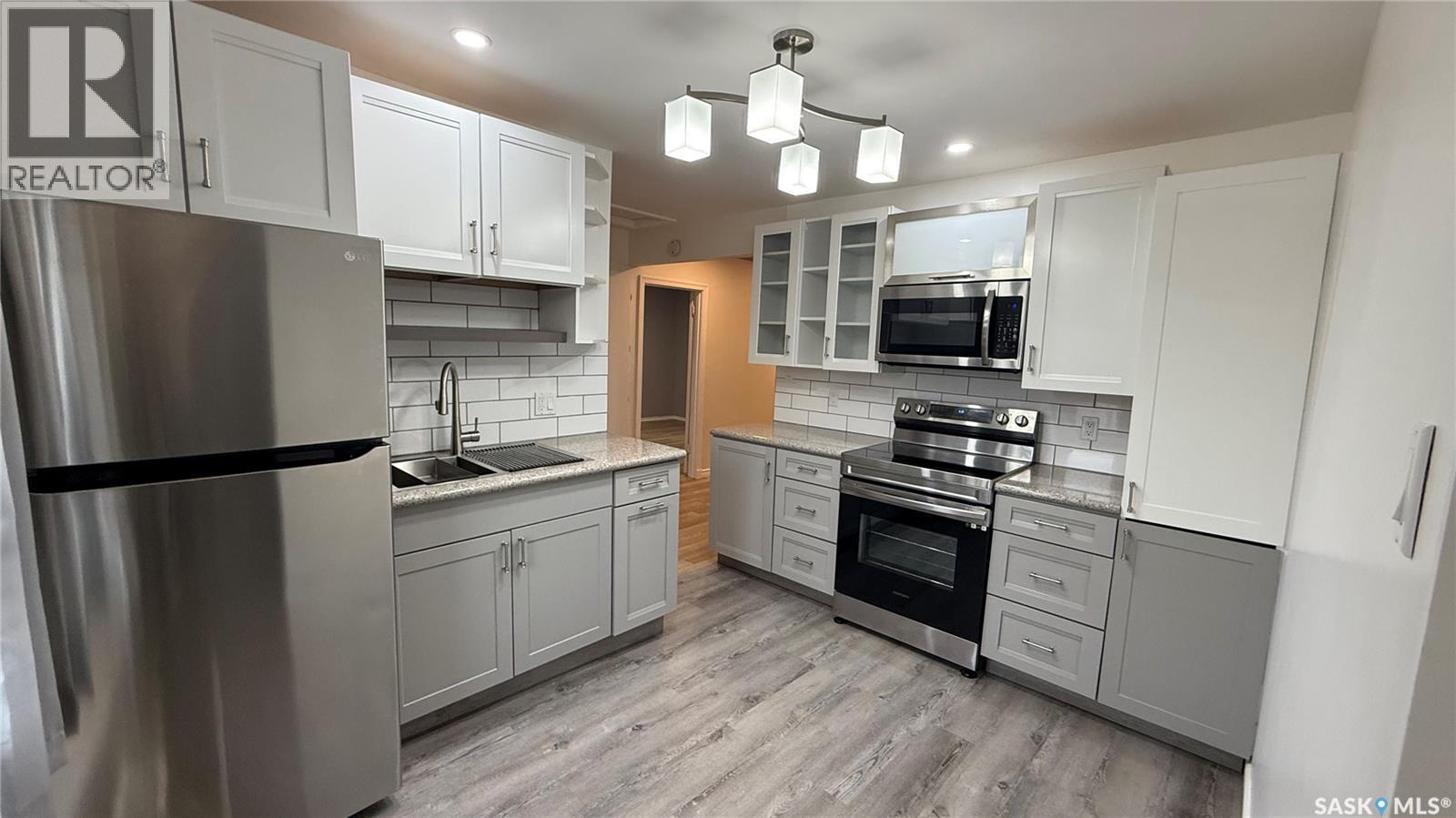 4124 4Th Avenue, Regina, SK - Indoor Photo Showing Kitchen With Stainless Steel Kitchen With Upgraded Kitchen
