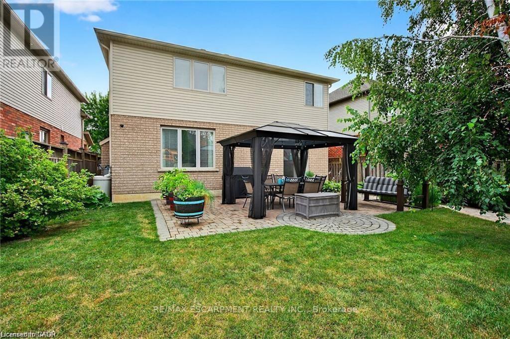 Yard w/gazebo, shed, fenced yard, interlock patio - 39 Wilbur Drive, Hamilton, ON - Outdoor With Deck Patio Veranda