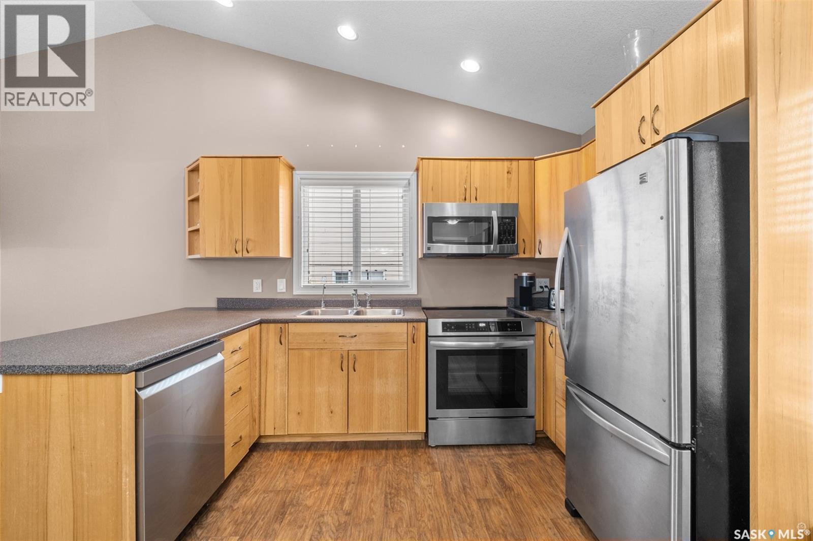 335 Ruttle Avenue, Kinistino, SK - Indoor Photo Showing Kitchen With Stainless Steel Kitchen With Double Sink