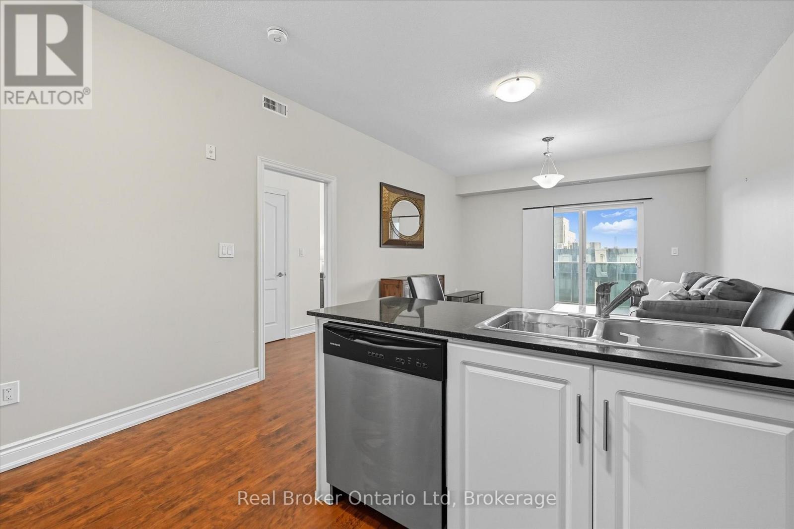 524 - 8111 Forest Glen Drive, Niagara Falls (Mt. Carmel), ON - Indoor Photo Showing Kitchen With Double Sink