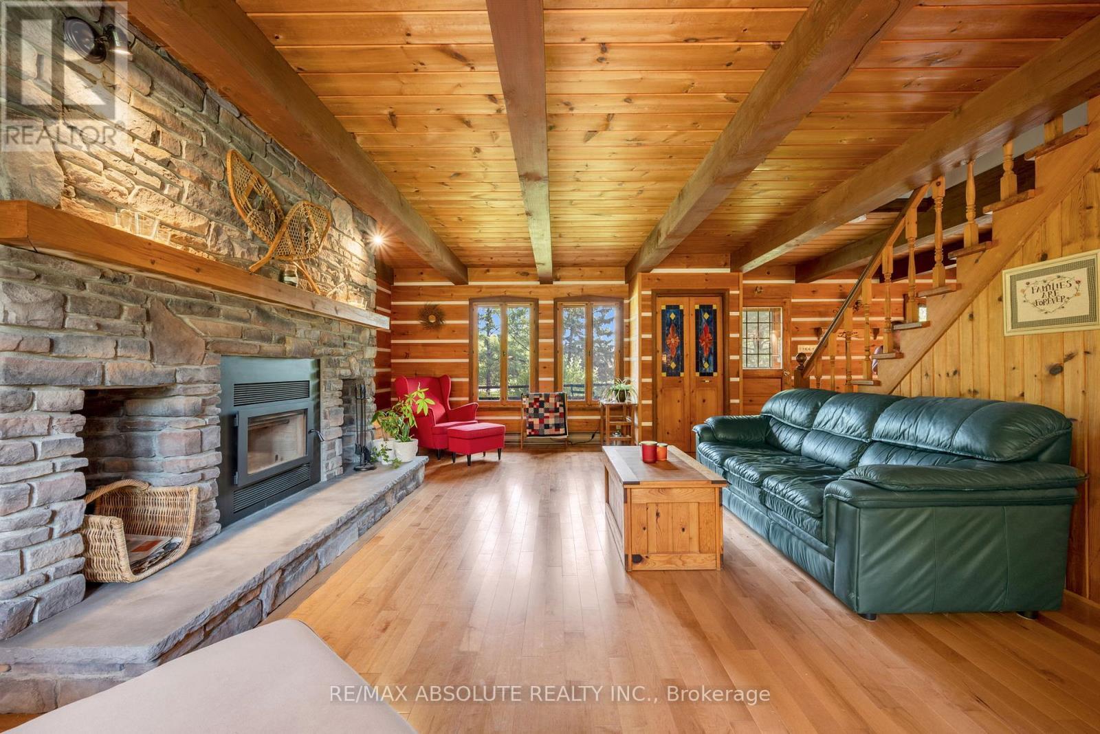 188 Burns Drive, Mcnab/Braeside, ON - Indoor Photo Showing Living Room With Fireplace