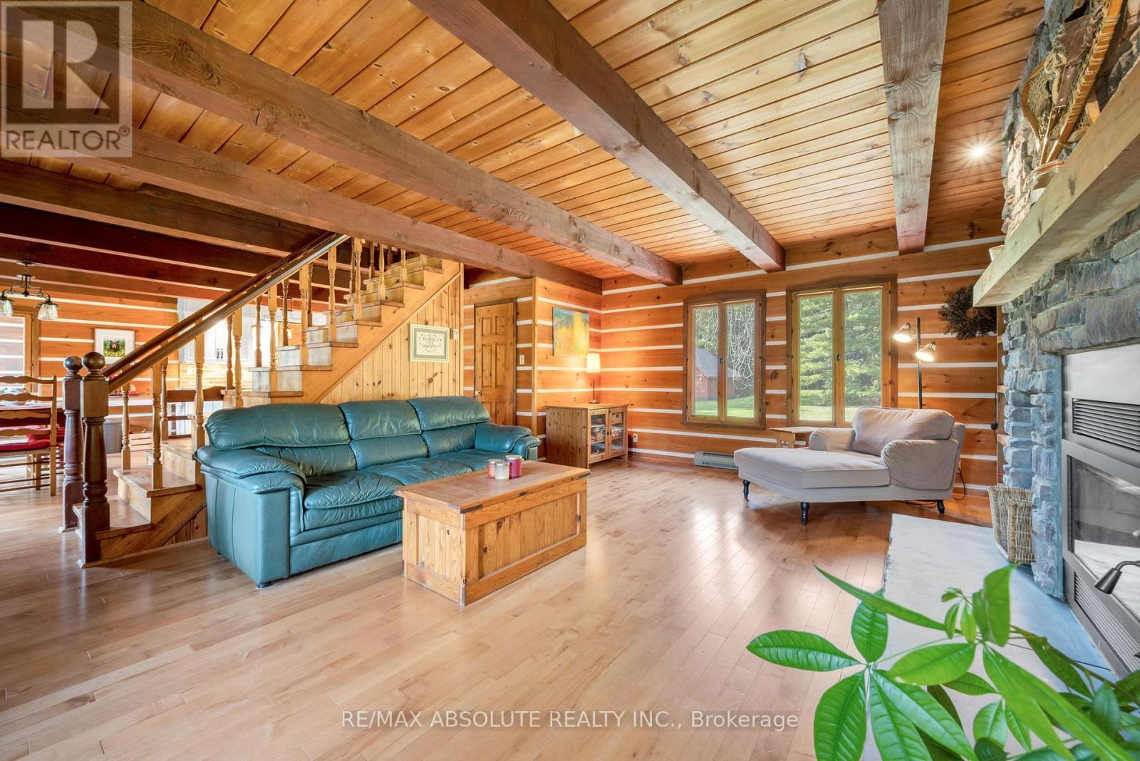 188 Burns Drive, Mcnab/Braeside, ON - Indoor Photo Showing Living Room With Fireplace