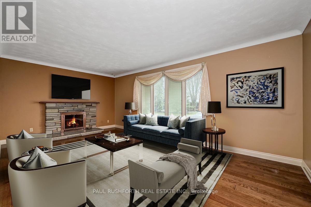 Virtually Staged - Living Room - 6 Roundhay Drive, Ottawa, ON - Indoor Photo Showing Living Room With Fireplace