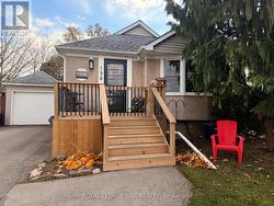 Welcoming front porch, perfect for morning coffee -