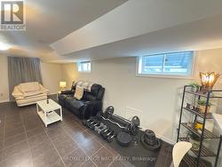 offers a warm and functional open-concept layout -