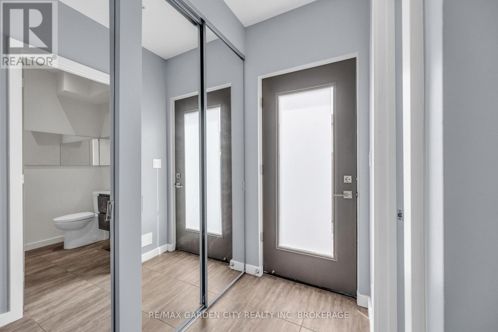 Separate access from the garage to the backyard - 12 1/2 Beamer Court, Thorold (Confederation Heights), ON - Indoor Photo Showing Other Room