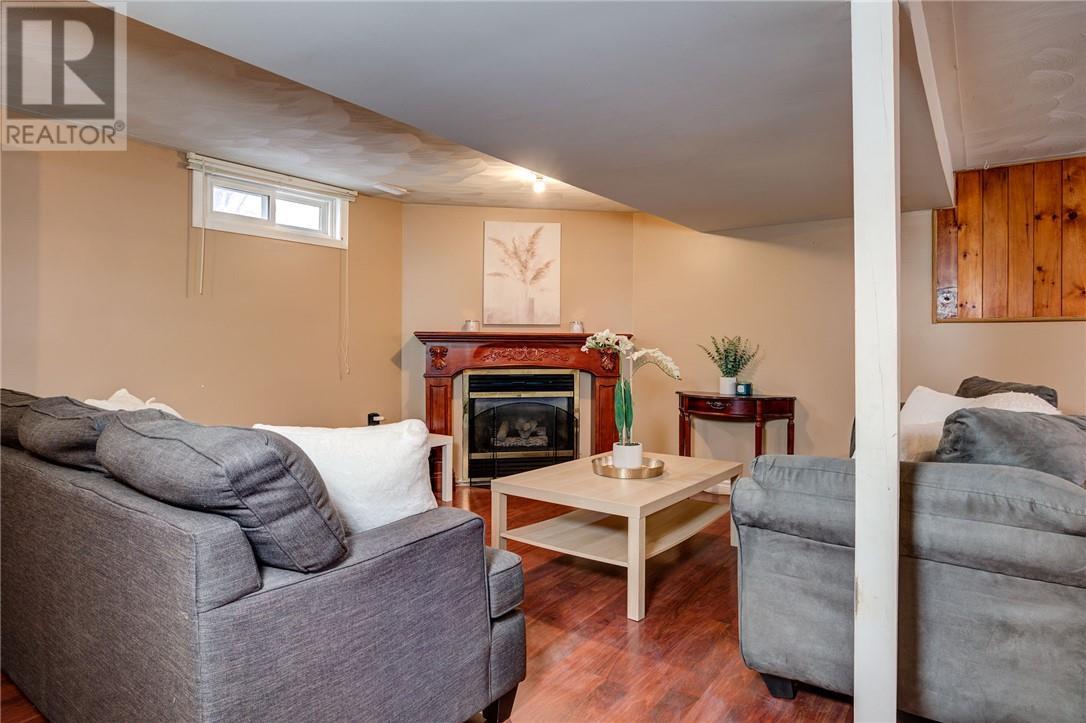 52 Abbe Street, Chelmsford, ON - Indoor Photo Showing Other Room With Fireplace