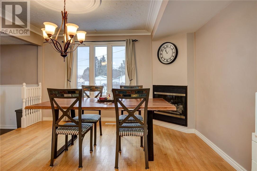 2 Leonard Avenue S, Dowling, ON - Indoor Photo Showing Dining Room With Fireplace
