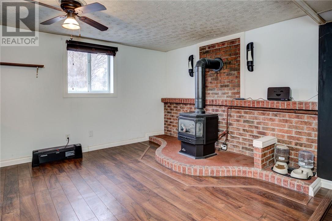 2 Leonard Avenue S, Dowling, ON - Indoor With Fireplace