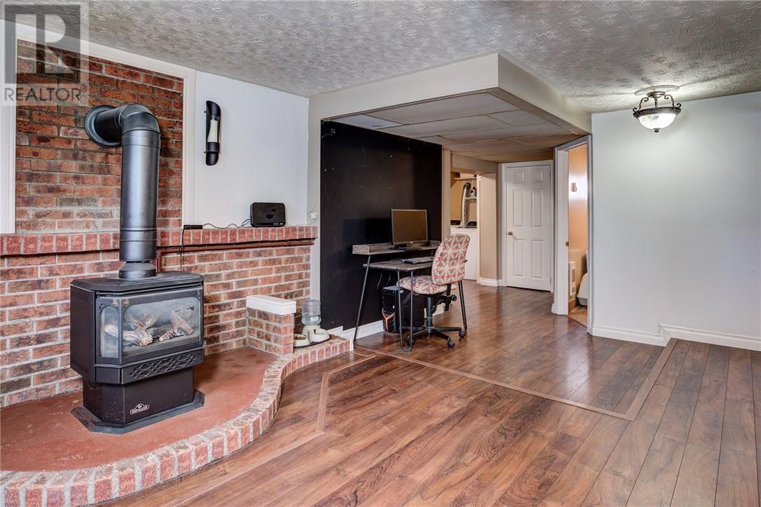 2 Leonard Avenue S, Dowling, ON - Indoor With Fireplace