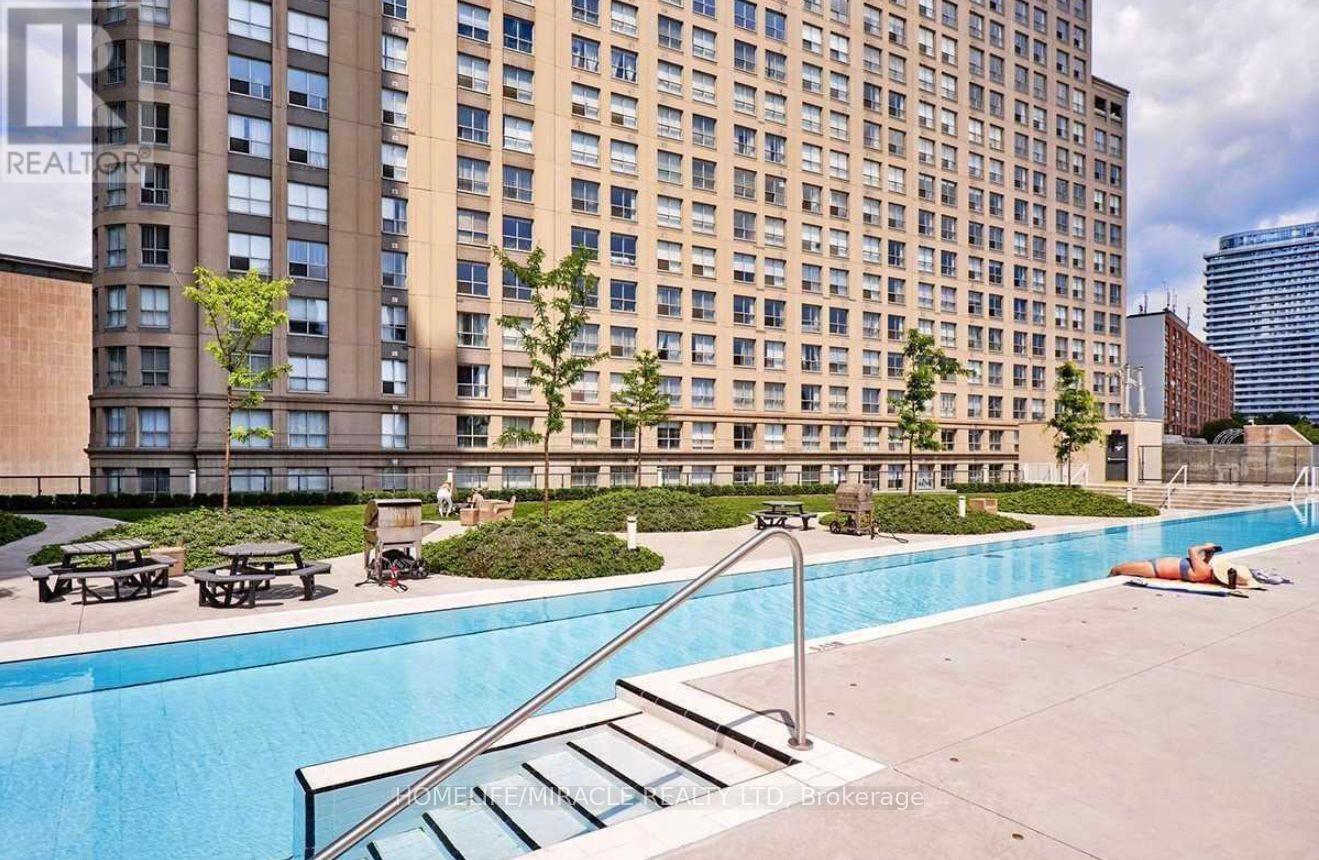 1604 - 1 The Esplanade, Toronto, ON - Outdoor With In Ground Pool With Facade