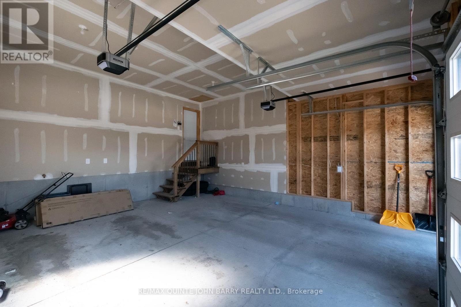 Double Car Garage - 29 Cattail Crescent, Quinte West (Murray Ward), ON - Indoor Photo Showing Garage