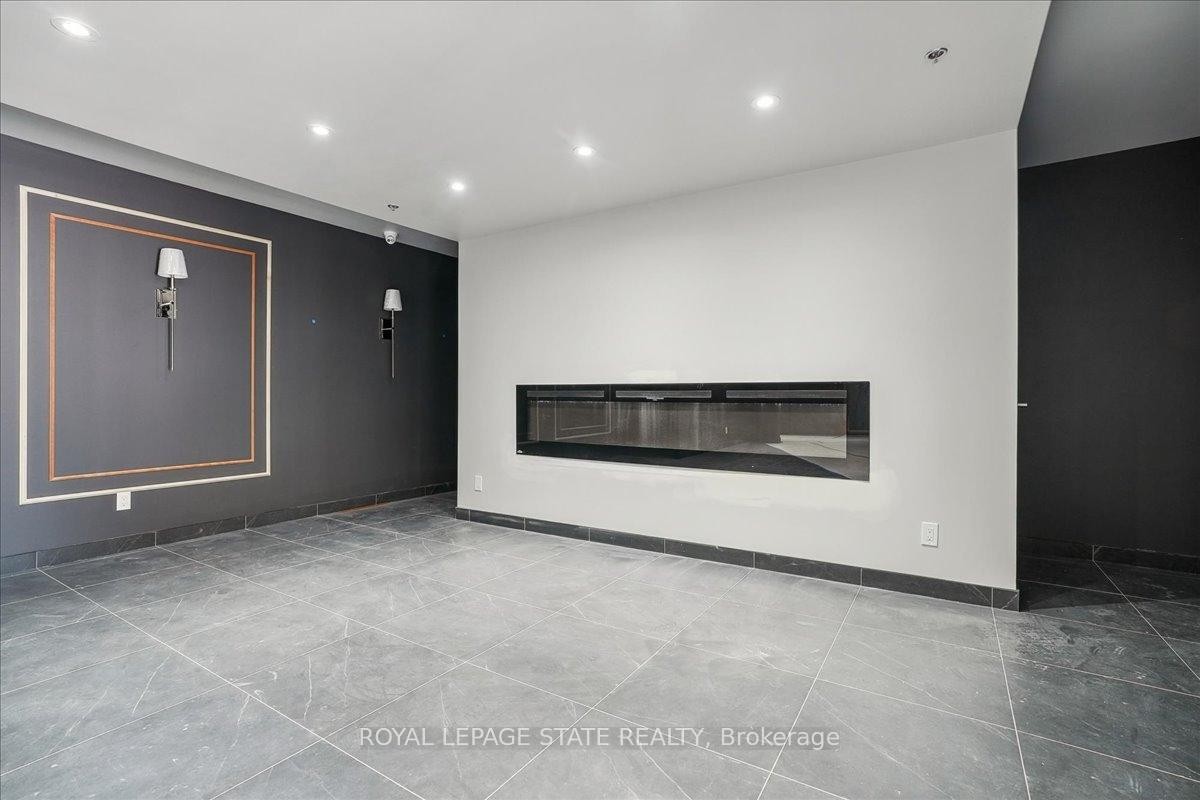 124-153 Wilson Street W, Hamilton, ON - Indoor With Fireplace