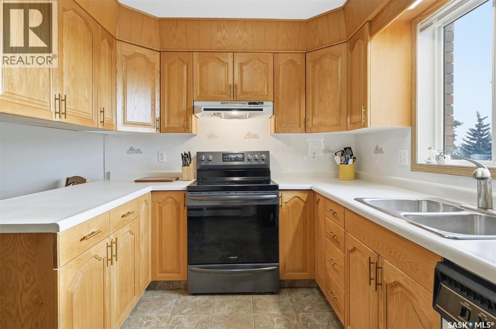 201 103 Keevil Crescent, Saskatoon, SK - Indoor Photo Showing Kitchen With Double Sink